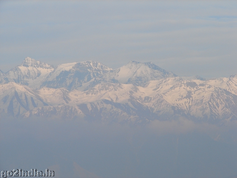 Sunset at Khajjiar snow capped hills